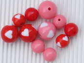 Lotto 10 perle cuore rosa e rosso vend.