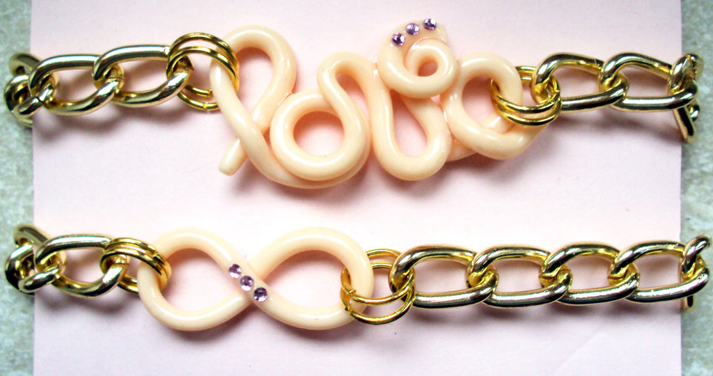 Braccialetto elastico color bronzo con charm - Gioielli - Bracciali