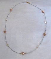 parure collana e bracciale in perle e cristalli su filo metallico