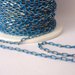Catena, Enamel coated chain, ovale  Colore: azzurro/dorato.  Link da 2,1 mm  3,20 euro/metro