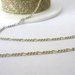 Catenina,Enamel coated chain, Figaro  Colore: avorio/dorato.  Link da 1,75 mm  2,90 euro/metro
