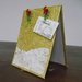 Portafoto in carta oro com mollette renna
