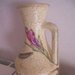 vaso con manico decorato a mano