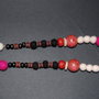 Collana con perle colorate in lana cotta 