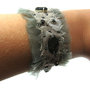 Bracciale realizzato con passamaneria con pietre, specchi, perle, strass 