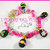 Bracciale "Ovetti di pasqua al cioccolato" mod. ovetti piccoli madreperla fucsia fimo cernit kawaii