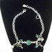 Bracciale catena con charms verde