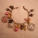 Bracciale in metallo anallergico bronzo con charms "Alice nel paese delle meraviglie"