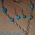 collana e orecchini acciaio e howlite turchese