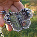 Collana con farfalla in filigrana e cristalli blu