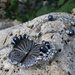 Collana con farfalla in filigrana e cristalli blu