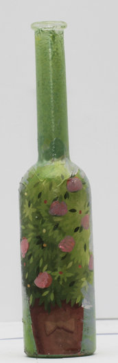 Bottiglietta porta essenze con vaso di fiori