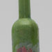 Bottiglietta porta essenze con vaso di fiori