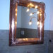 specchio grande con luci