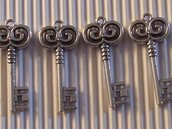4 charms chiave 35x16mm vend.