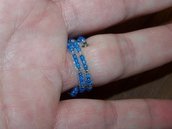 SALDI SALDI SALDI - Anello home made, con piccole perline azzurre e base di fil di ferro - PREZZO RIBASSATO!!!!!