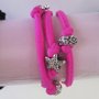 Bracciale rosa con charms 