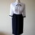 Elegant white and dark blue 1980s summery vintage polyester secretary dress.