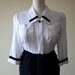 Elegant white and dark blue 1980s summery vintage polyester secretary dress.