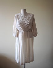 Beautiful and elegant cream/champagne 1980s vintage polyester secretary/ day/ evening dress.