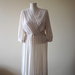 Beautiful and elegant cream/champagne 1980s vintage polyester secretary/ day/ evening dress.