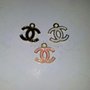 Charm Chanel cc oro bianco 