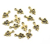 5 charms giglio dorato 17x10 mm scontato