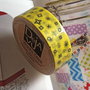 1 washi tape giallo con simboli scuri