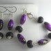 bracciale e orecchini viola e nero