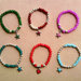 Braccialetti elastici con perle e stelline colorate fimo