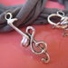 Collana / bracciale in fettuccia color fango e charms