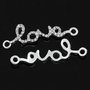 CONNETTORE STRASS SCRITTA LOVE in corsivo 3.9x1.2cm scontato 