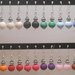 Orecchini con Perla di pasta fimo in vari colori. mod.c01