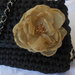 Borsa  pochette  fatta a mano con  fettuccia nera  con   fiore  beige in organza ,in  regalo  portachiavi  borsettina.