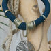 Bracciale artigianale in stile egiziano impreziosito da medaglietta decorata