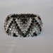 Bracciale"Capricho" con biconi simil Swarovski di colore nero,argento e trasparente
