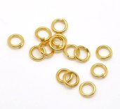 50 anelli ,anellini apribili dorati circa 5 mm metalo
