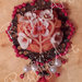 Orecchini in metallo bronzato con applicazioni floreali in pasta di mais “Whiteness on red”