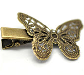 base pinzetta , fermacapelli con farfalla in filigrana. bronzo scontato