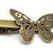 base pinzetta , fermacapelli con farfalla in filigrana. bronzo scontato