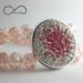 Bracciale a filo doppio con pietre sfaccettate rosa e inserto in metallo con strass