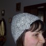 Cappello di lana con fiore