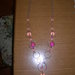 collana con cerchi e perle rosa