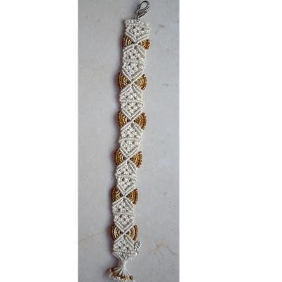 Bracciale in macramè con perline marroni trasparenti Bracciale in macramè con perline marroni trasparenti
