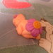 Bebè fimo con fiore lilla - bomboniere,regalo,nascita,battesimo