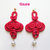 Orecchini handmade ghirigori fimo - cernit color rosso rubino 