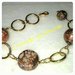 bracciale catena color oro con perle di vetro marrone