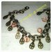 bracciale pendenti perle di vetro rosa e charms bronzo