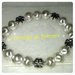bracciale elastico con perle grigie e charms msrghetita color argento