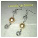 orecchini pendenti con perle bianchi e perle in filigrana color argento
